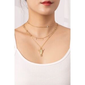 Layered cow skull necklace